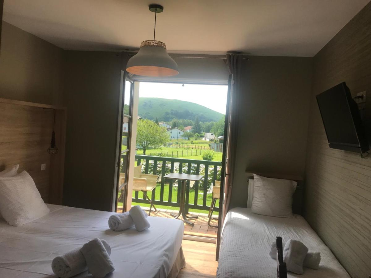 Un ou plusieurs lits dans un hébergement de l'établissement Hotel Mendionde
