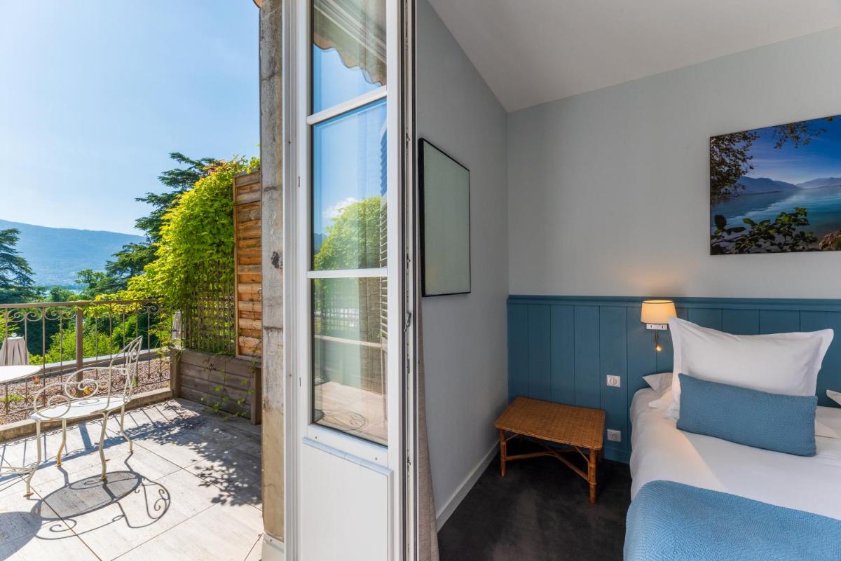 Balcon ou terrasse dans l'établissement Hôtel Beau Site Talloires B SPA