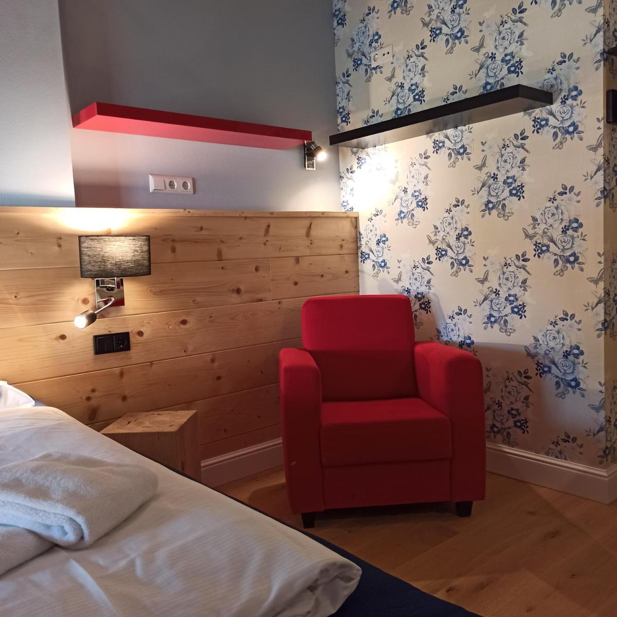 Ein Bett oder Betten in einem Zimmer der Unterkunft Design Hotel ALPENLIEBE - - - - Boutique-Flair - - - -