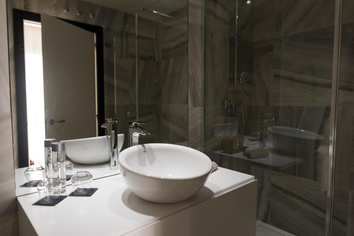 Un baño de Cosmopolita Hotel Boutique & Spa