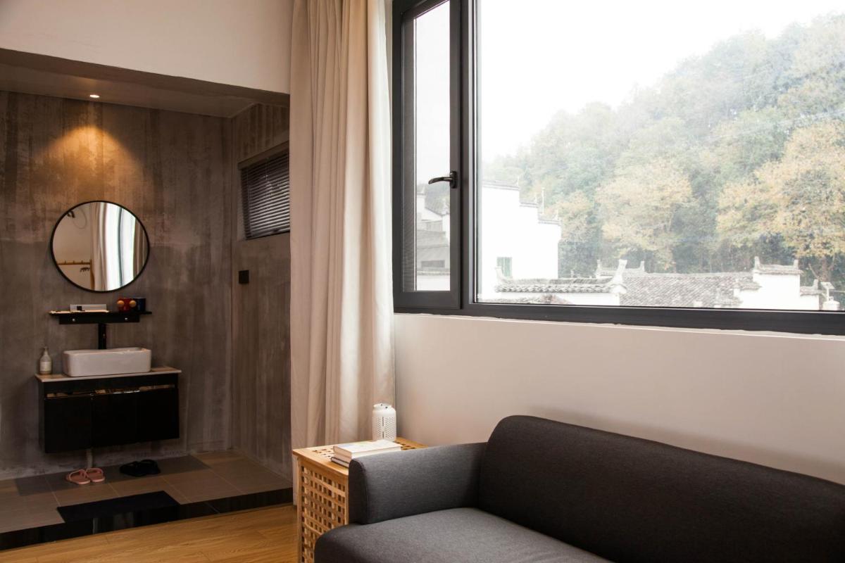 Wuyuan Yi Chuan Yi Su River View Sen Hotel - Housity