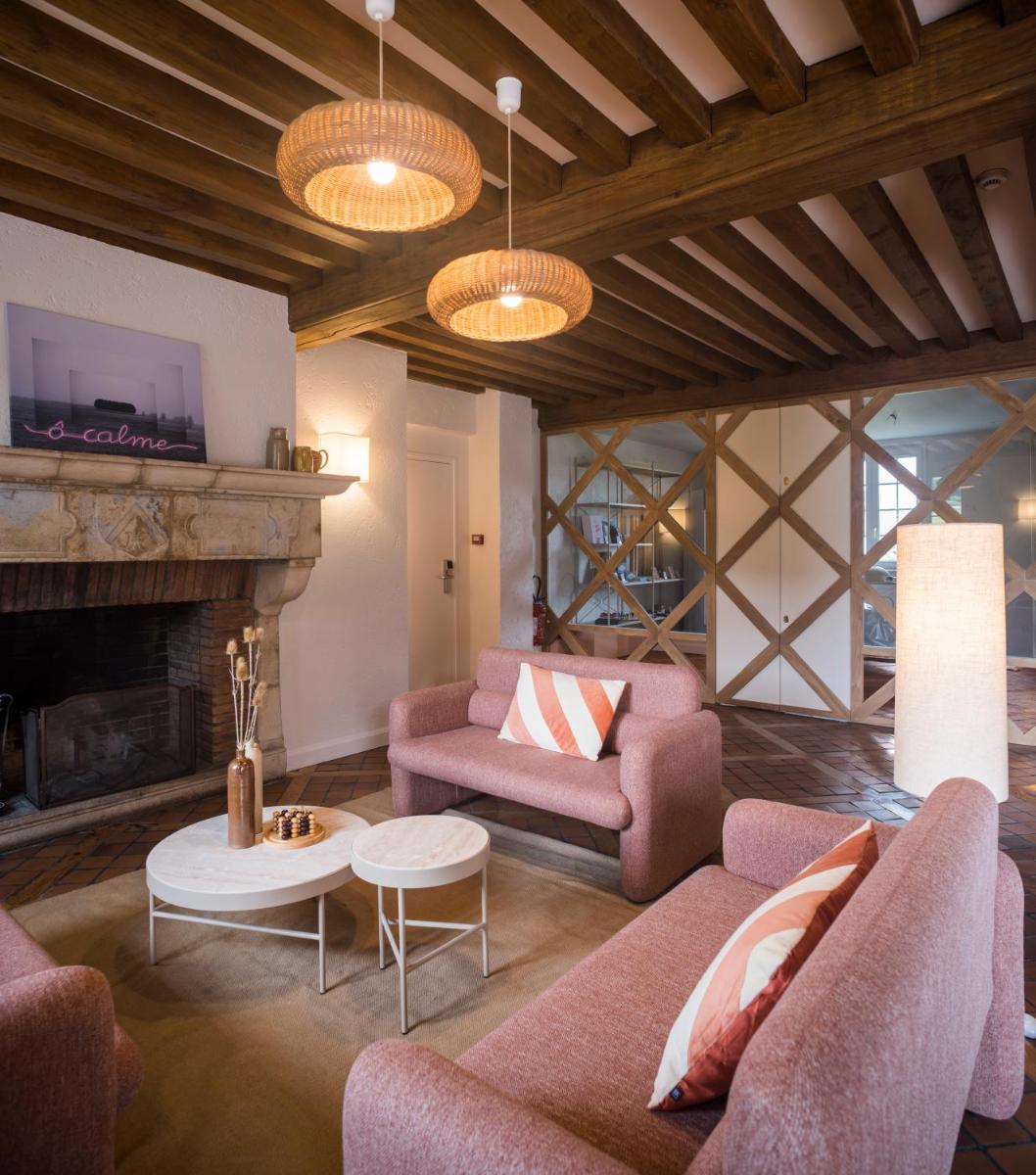 Coin salon dans l'établissement Hôtel-Spa Ô Rouge - Gevrey-Chambertin - Teritoria