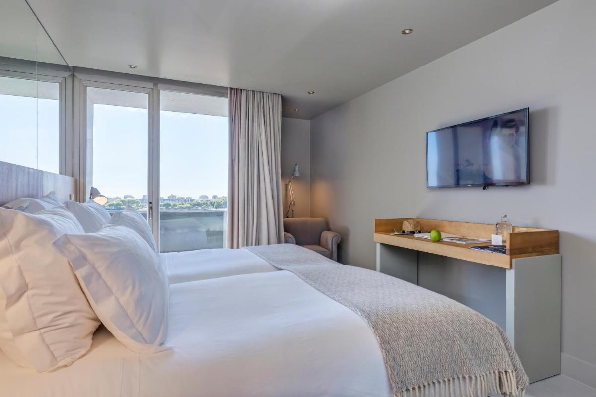 Uma cama ou camas num quarto em Villa C Boutique Hotel