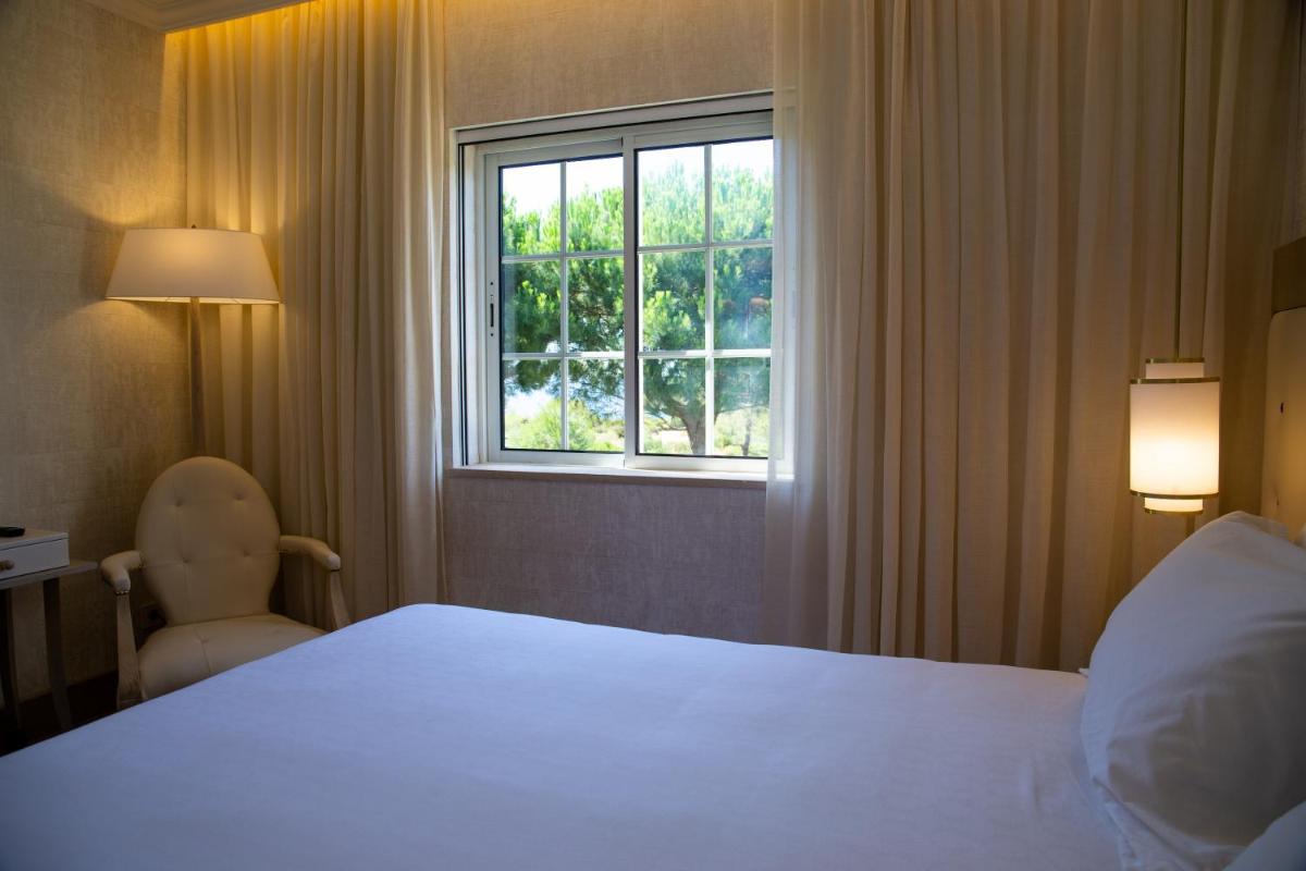 Uma cama ou camas num quarto em Vila Alba Resort