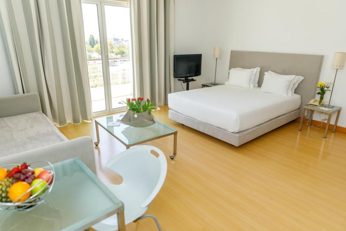 Uma cama ou camas num quarto em Marina Club Lagos Resort