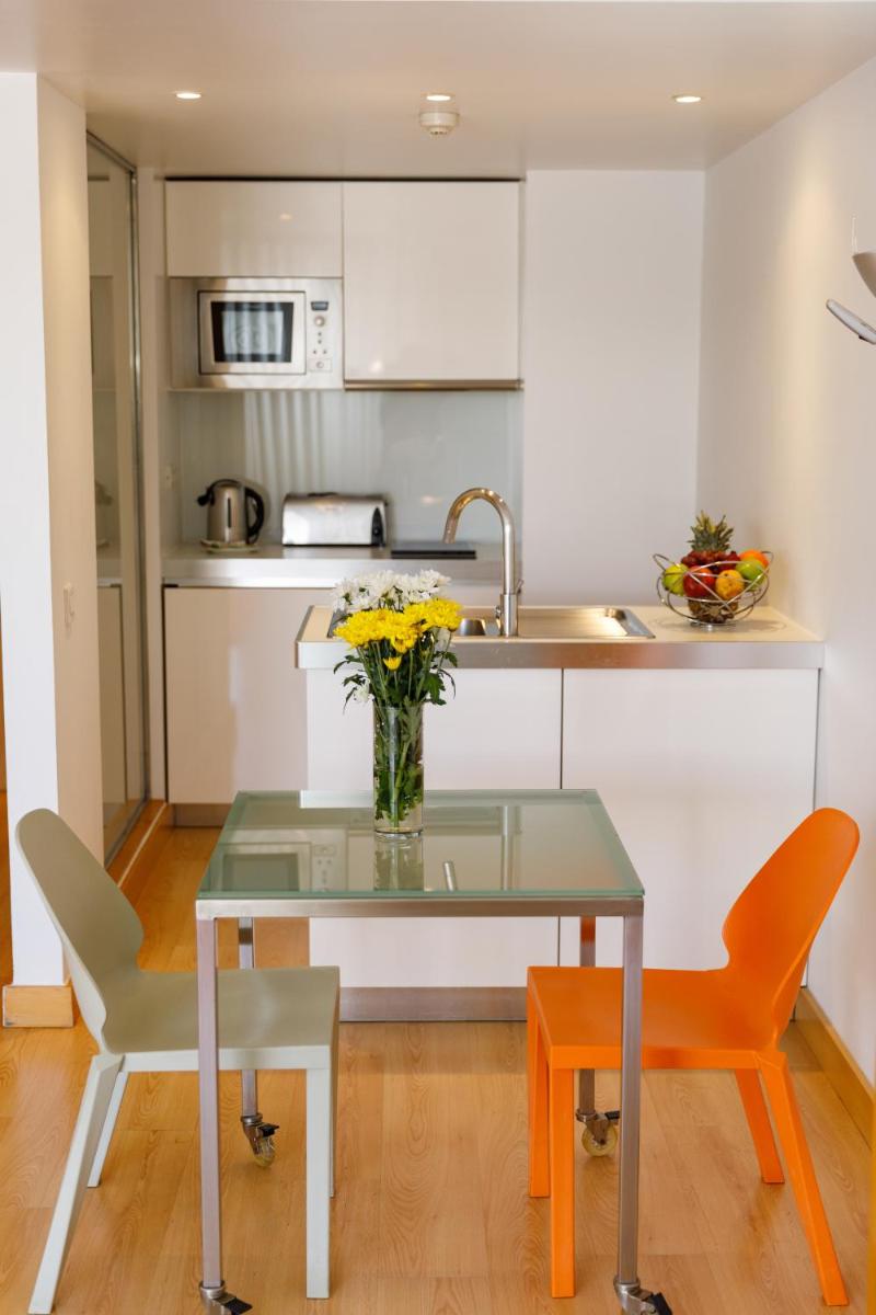 A cozinha ou kitchenette de Marina Club Lagos Resort
