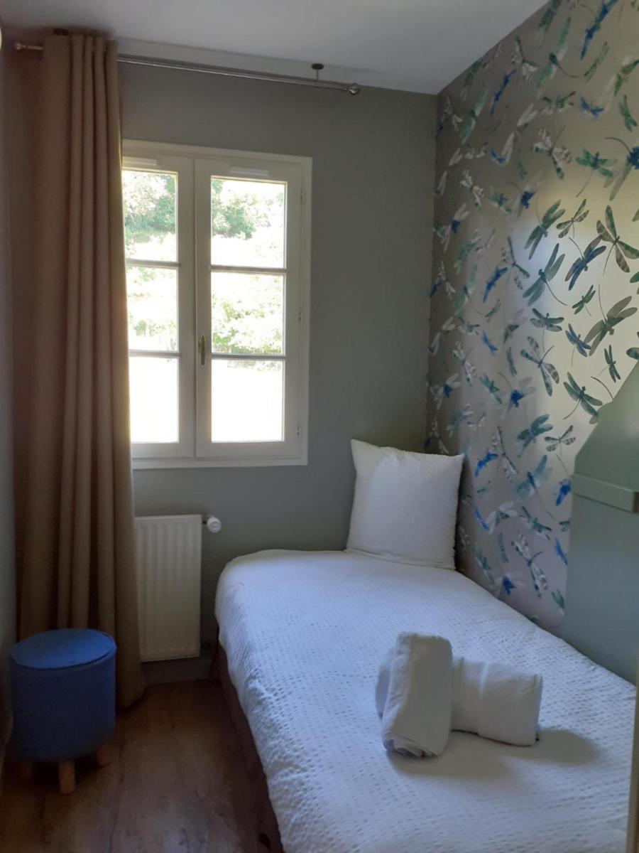 Un ou plusieurs lits dans un hébergement de l'établissement Hotel Mendionde