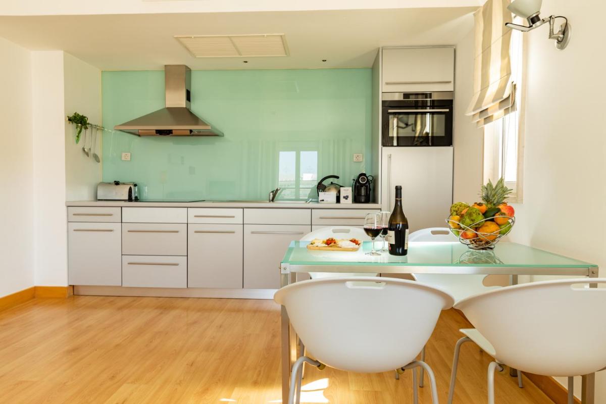 A cozinha ou kitchenette de Marina Club Lagos Resort