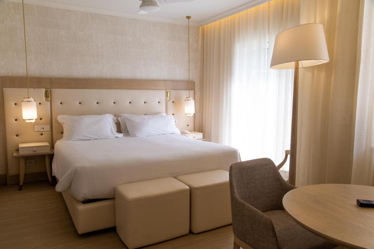 Uma cama ou camas num quarto em Vila Alba Resort