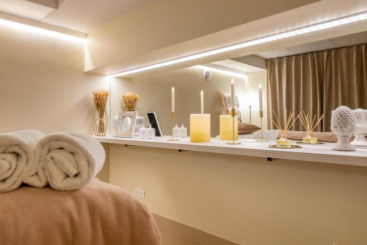 Un ou plusieurs lits dans un hébergement de l'établissement Hotel Residence Europe & Spa