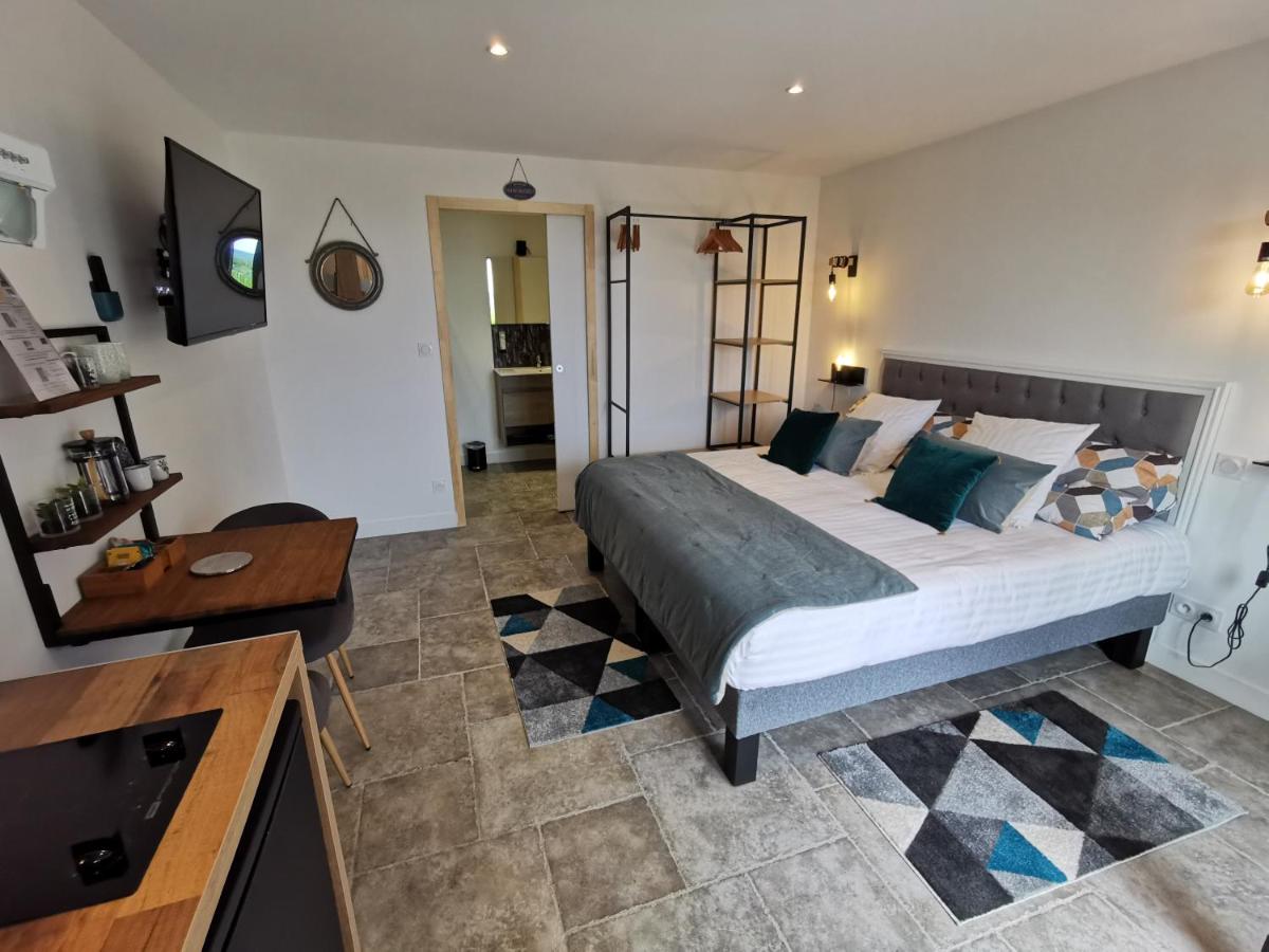 Un ou plusieurs lits dans un hébergement de l'établissement Les Terrasses de Saumur - Hôtel & Appartements - Restaurant & Spa (Logis)