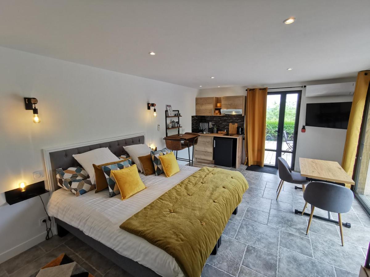 Un ou plusieurs lits dans un hébergement de l'établissement Les Terrasses de Saumur - Hôtel & Appartements - Restaurant & Spa (Logis)
