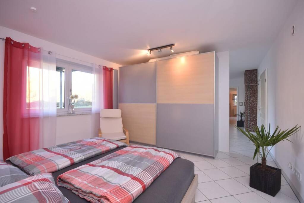 Ferienwohnung Gartenblick an der Mainschleife - Housity
