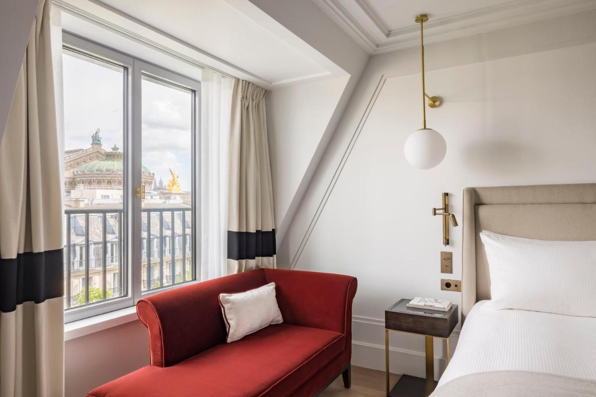 Un ou plusieurs lits dans un hébergement de l'établissement Kimpton - St Honoré Paris by IHG