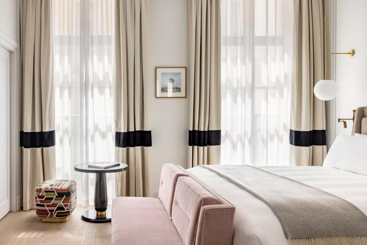 Un ou plusieurs lits dans un hébergement de l'établissement Kimpton - St Honoré Paris by IHG