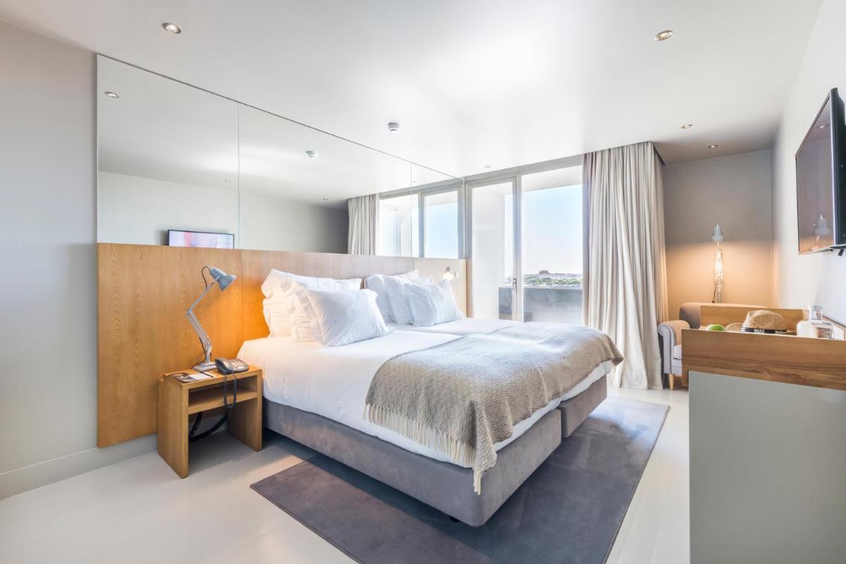 Uma cama ou camas num quarto em Villa C Boutique Hotel