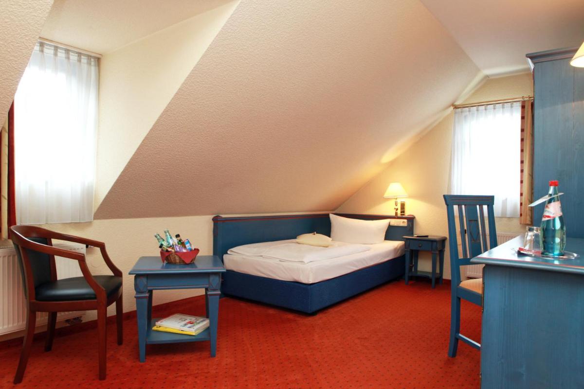 Hotel Erbgericht Buntes Haus - Housity
