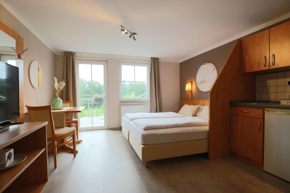 Hofgut Langenborn Wohnen auf Zeit möblierte Apartments Aschaffenburg Alzenau Frankfurt - Housity