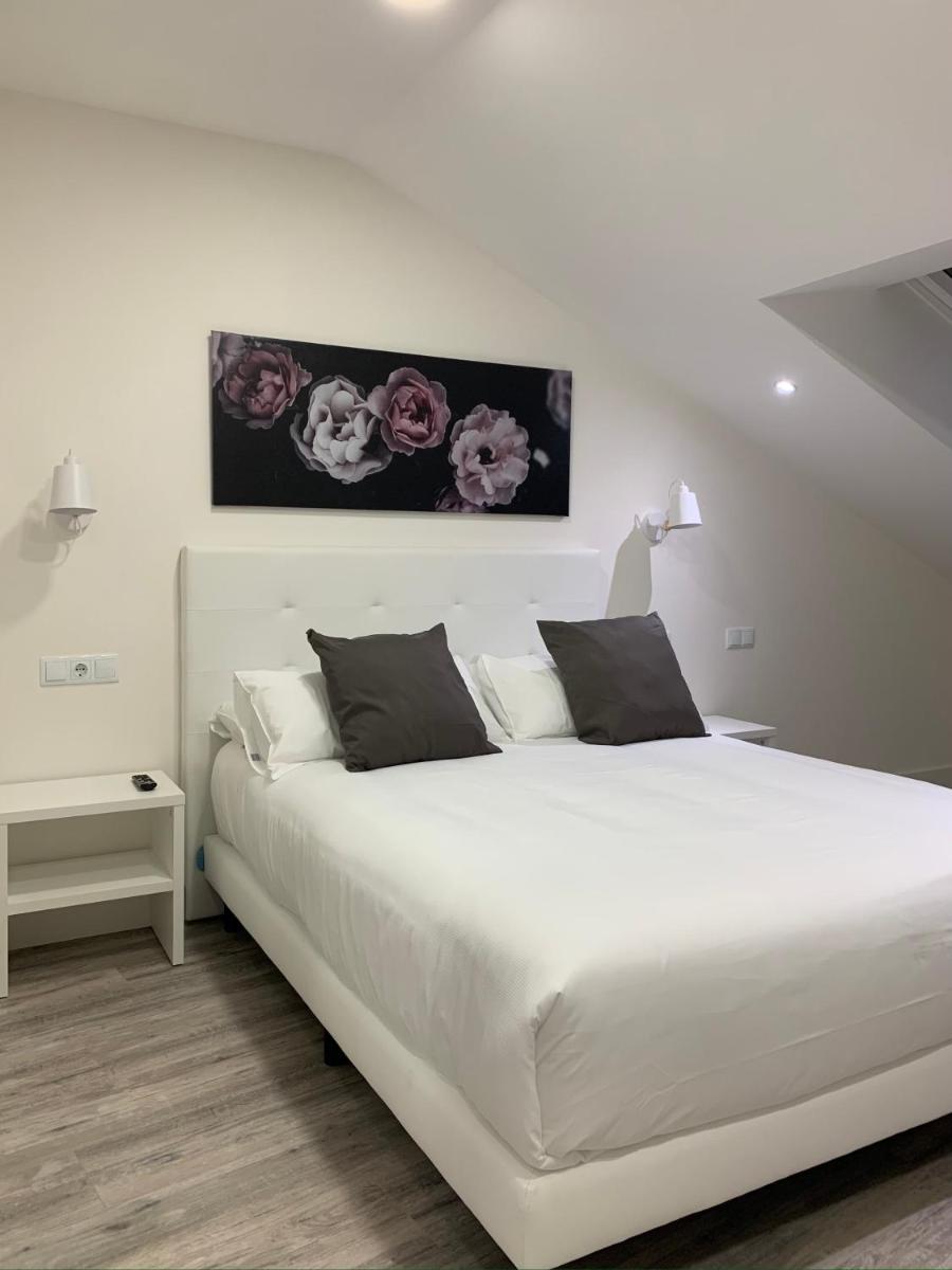 Hostal Comfort Suites - Housity