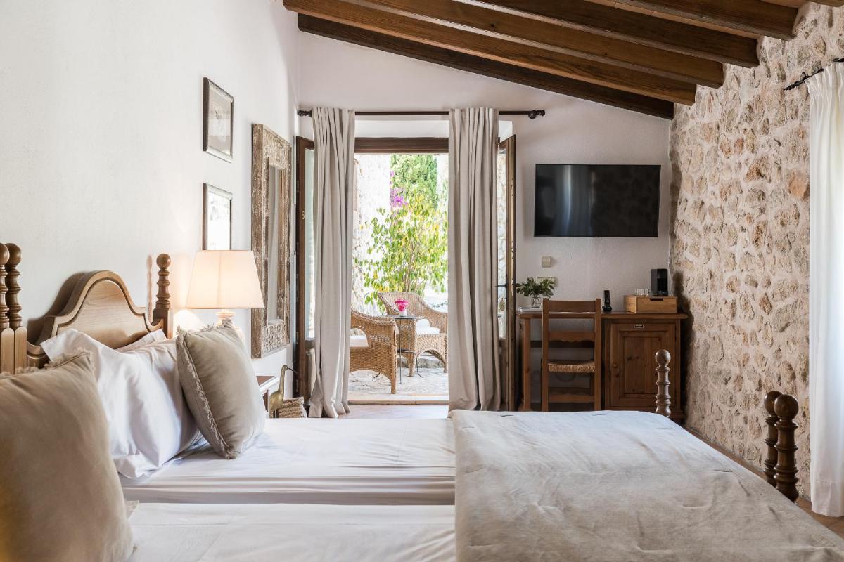 Cama o camas de una habitación en Ca'n Beneït