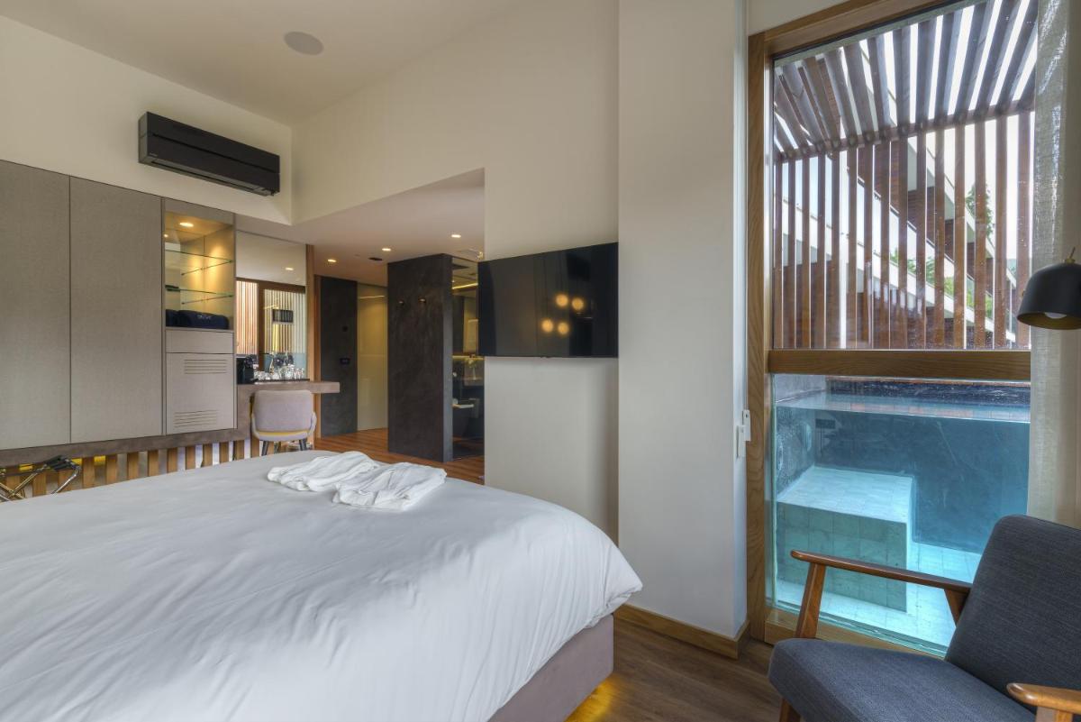 Uma cama ou camas num quarto em Hotel Rural Vale Do Rio