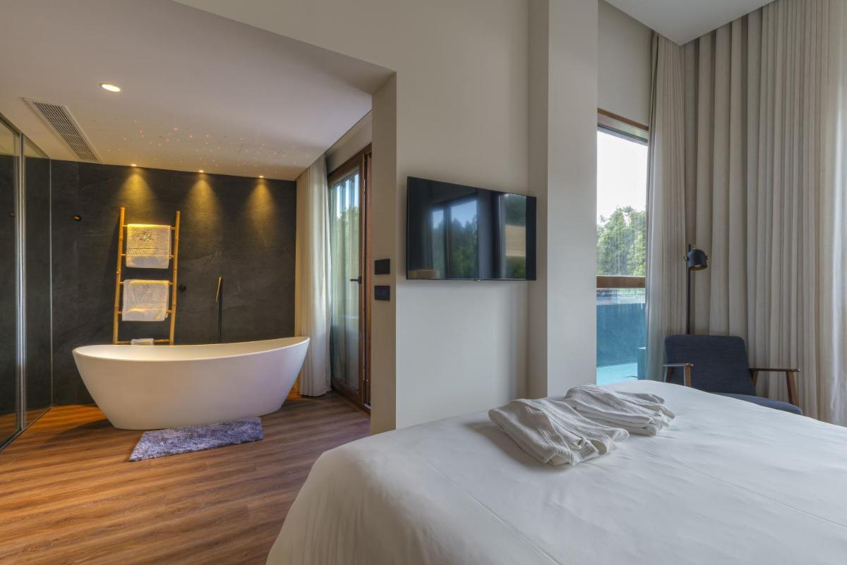 Uma cama ou camas num quarto em Hotel Rural Vale Do Rio