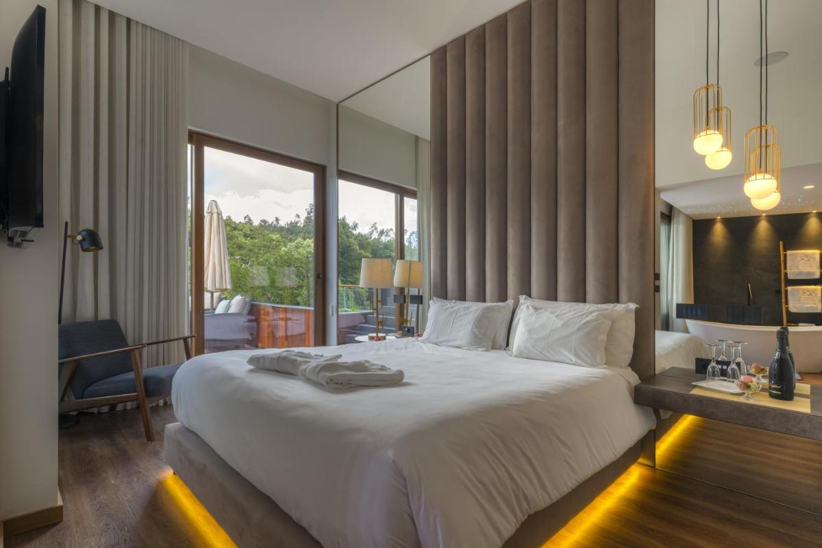 Uma cama ou camas num quarto em Hotel Rural Vale Do Rio