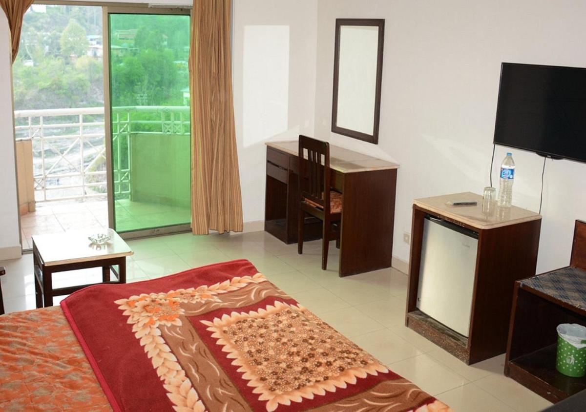Sangam Hotel Muzaffarabad - Housity