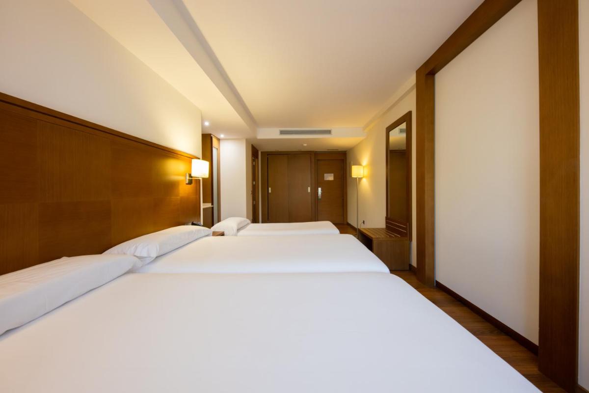Cama o camas de una habitación en Hotel Thalasso Cantabrico Las Sirenas 4 Superior