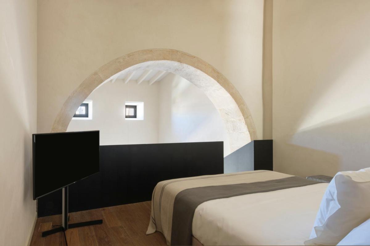 Cama o camas de una habitación en Can Ferrereta