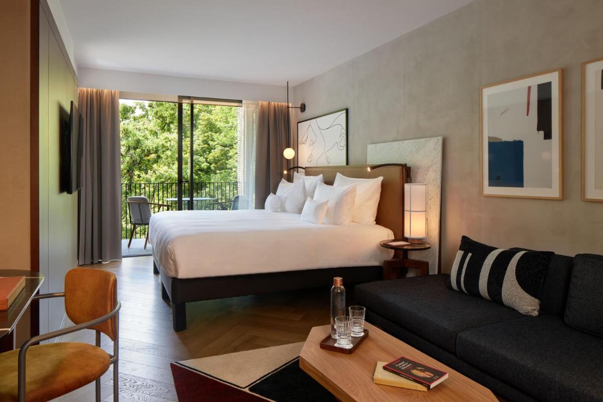 Un ou plusieurs lits dans un hébergement de l'établissement L'Esquisse Hotel & Spa Colmar - MGallery Collection