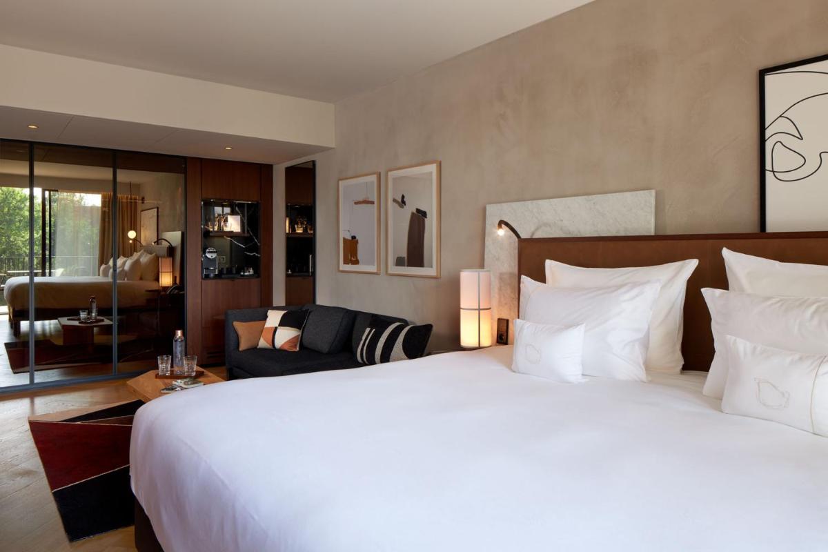 Un ou plusieurs lits dans un hébergement de l'établissement L'Esquisse Hotel & Spa Colmar - MGallery Collection