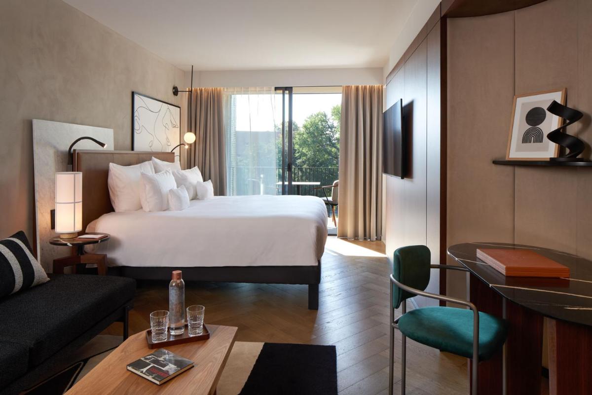 Un ou plusieurs lits dans un hébergement de l'établissement L'Esquisse Hotel & Spa Colmar - MGallery Collection