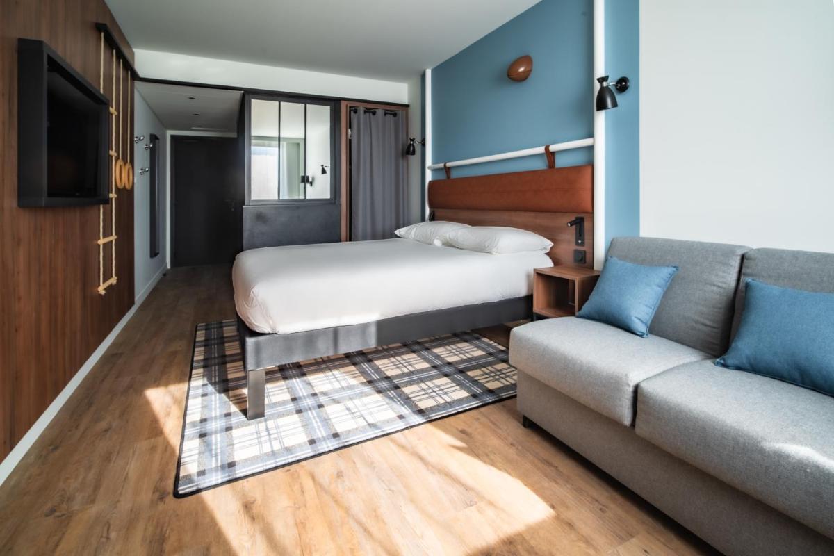 Un ou plusieurs lits dans un hébergement de l'établissement ibis Styles Castelnaudary