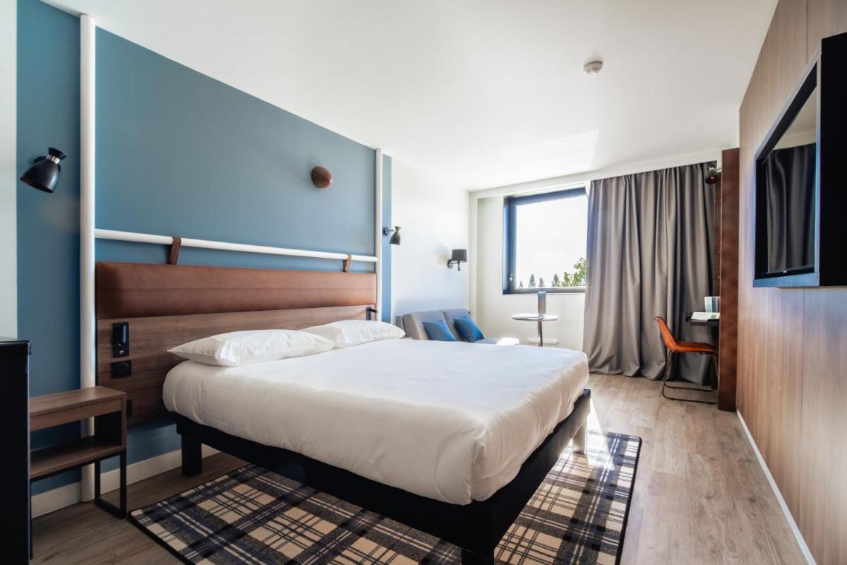 Un ou plusieurs lits dans un hébergement de l'établissement ibis Styles Castelnaudary