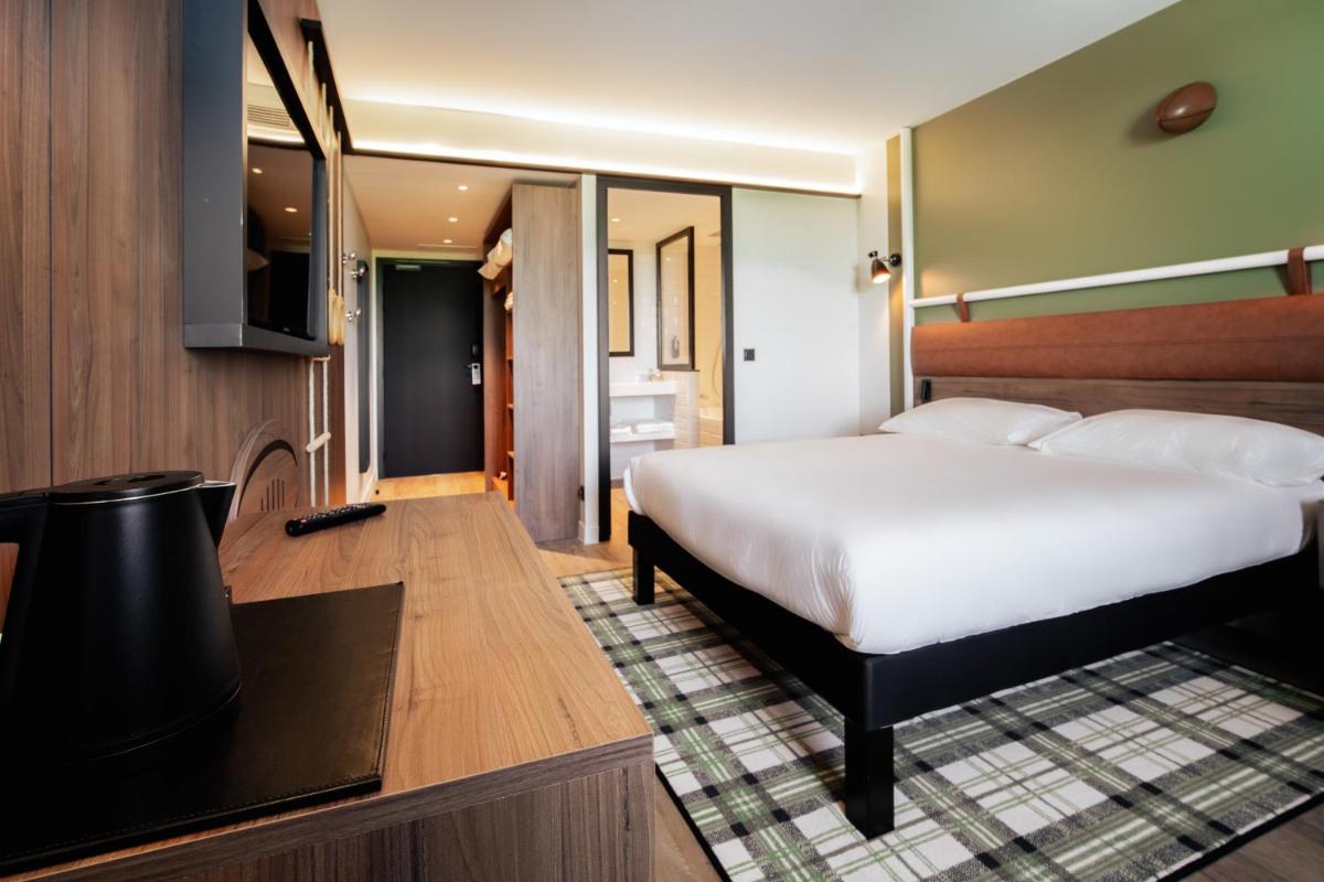 Un ou plusieurs lits dans un hébergement de l'établissement ibis Styles Castelnaudary