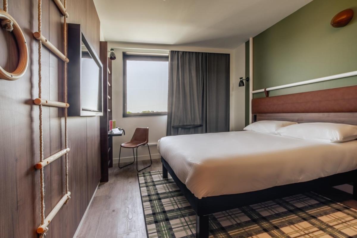 Un ou plusieurs lits dans un hébergement de l'établissement ibis Styles Castelnaudary