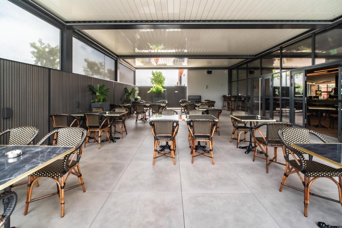 Restaurant ou autre lieu de restauration dans l'établissement ibis Styles Castelnaudary