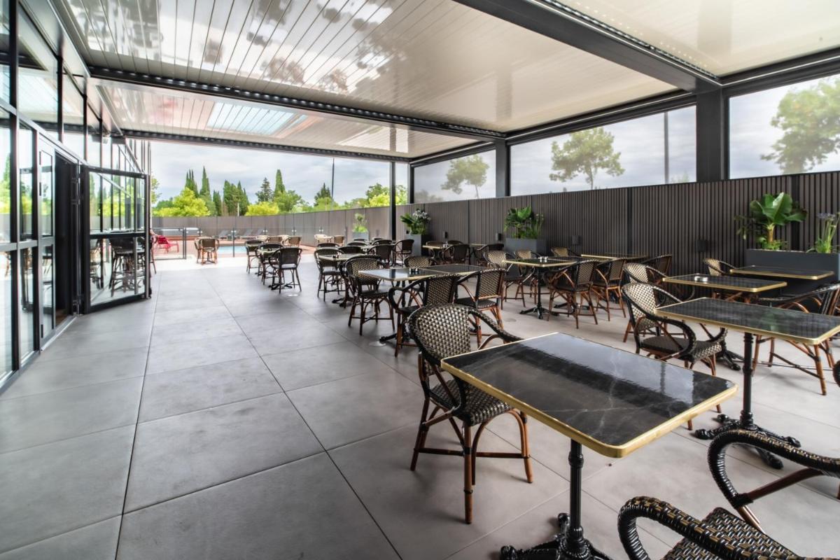 Restaurant ou autre lieu de restauration dans l'établissement ibis Styles Castelnaudary