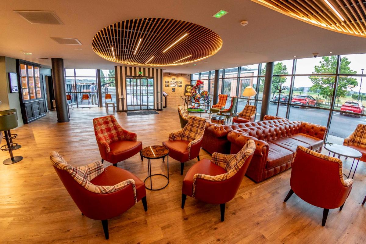 Coin salon dans l'établissement ibis Styles Castelnaudary