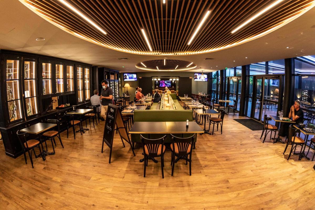 Restaurant ou autre lieu de restauration dans l'établissement ibis Styles Castelnaudary