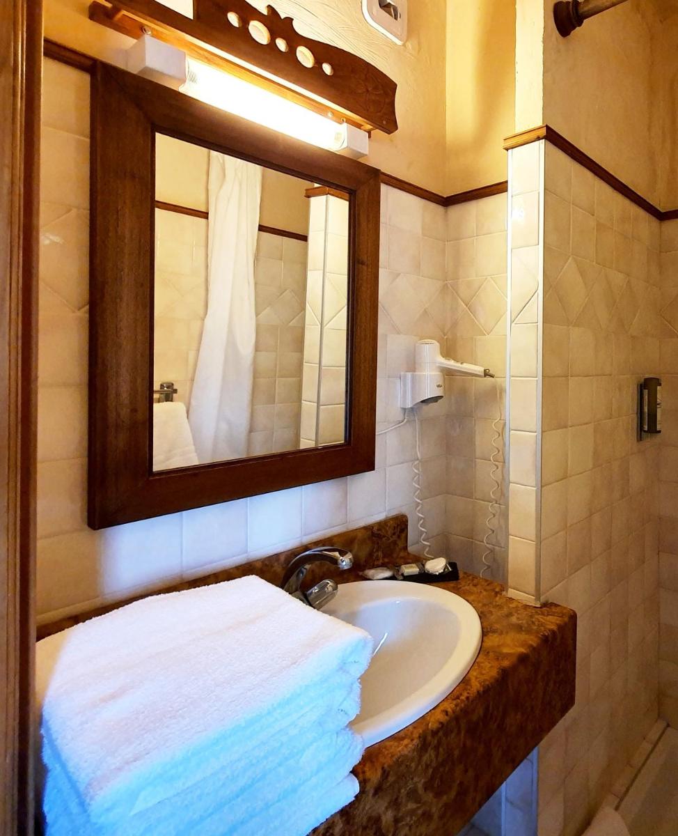 Salle de bains dans l'établissement Café-Hôtel Le Morillon, Domaine du Grand Massif-Samoëns
