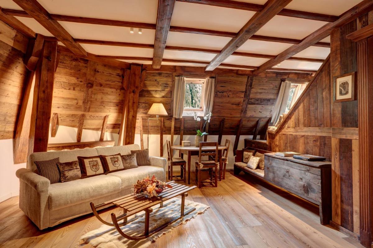 Coin salon dans l'établissement Grand Hôtel des Alpes