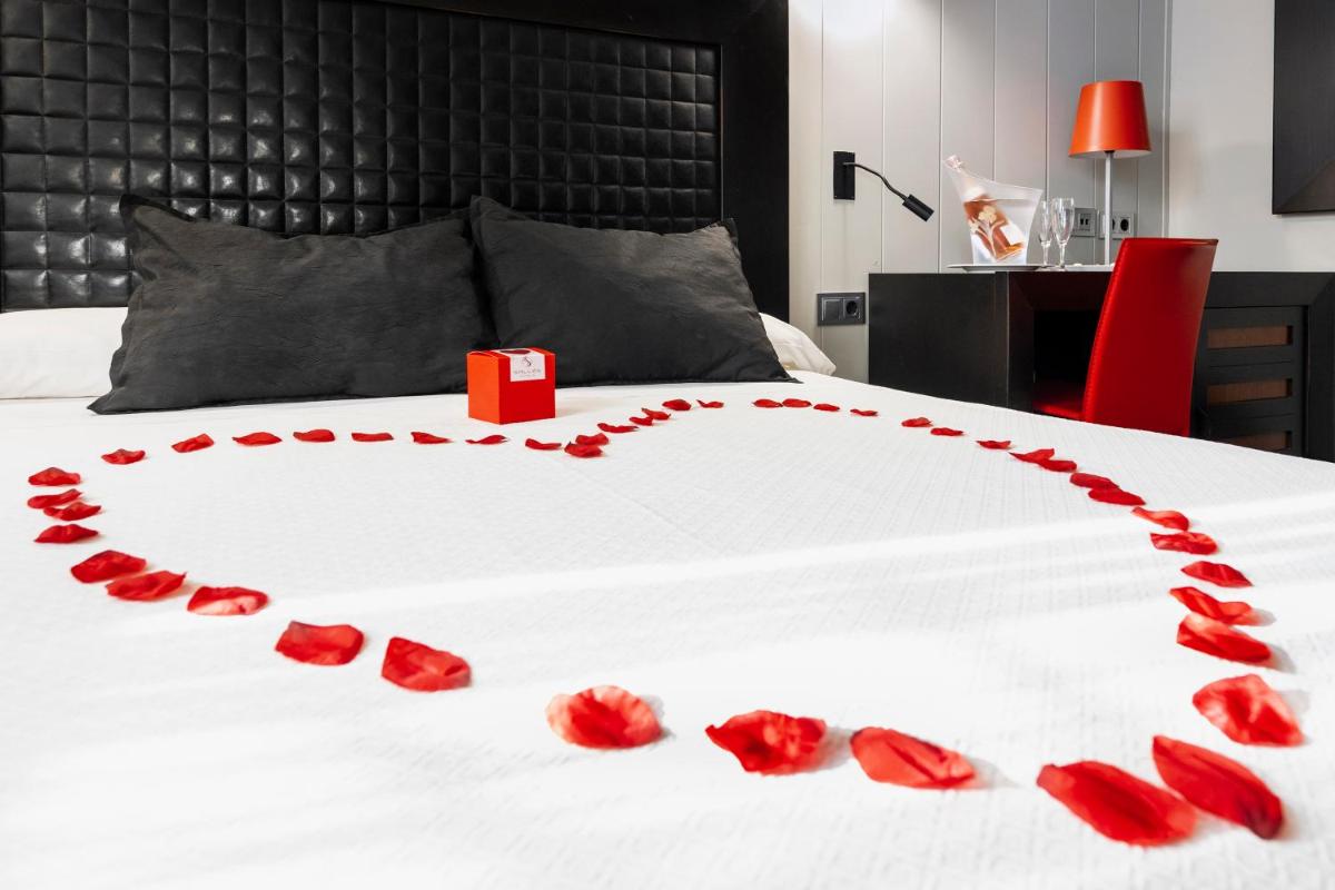 Cama o camas de una habitación en Salles Hotel Aeroport de Girona