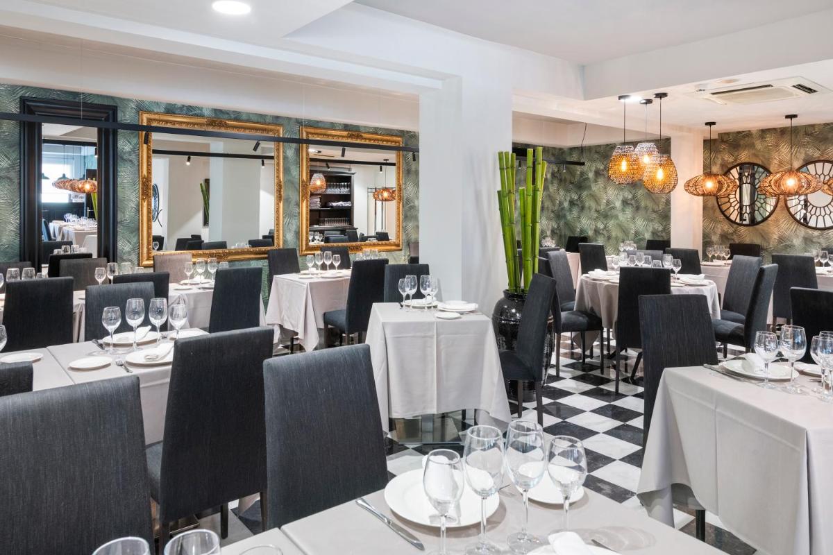 Un restaurante o sitio para comer en Salles Hotel Aeroport de Girona