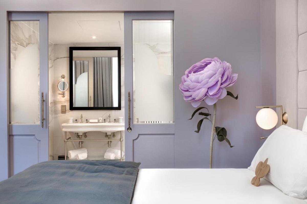 Un ou plusieurs lits dans un hébergement de l'établissement Hôtel Richer De Belleval - Relais & Châteaux