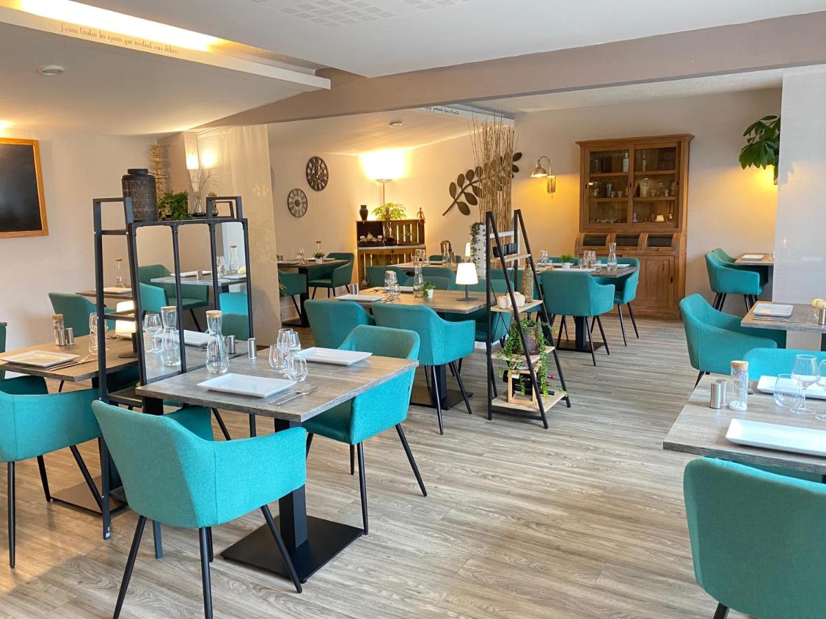 Restaurant ou autre lieu de restauration dans l'établissement Logis Latitude Ouest Hôtel Restaurant & Spa