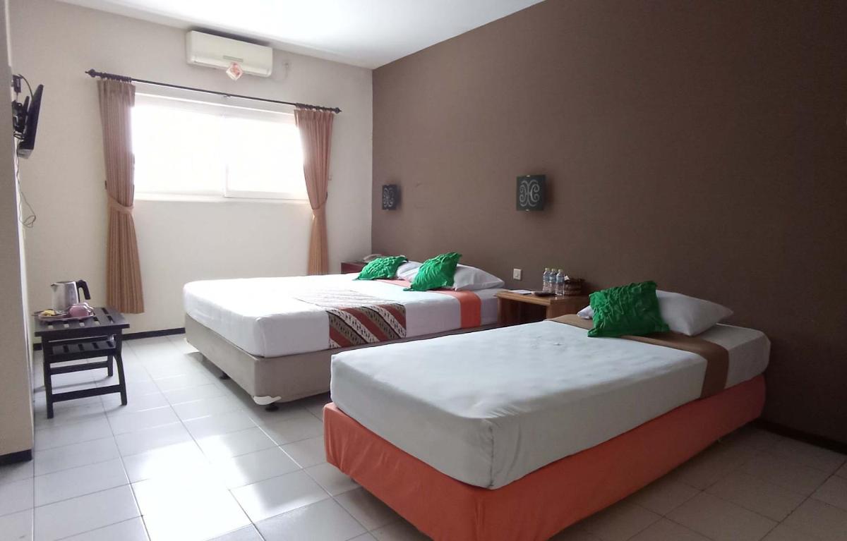 Helios Hotel Malang - Housity