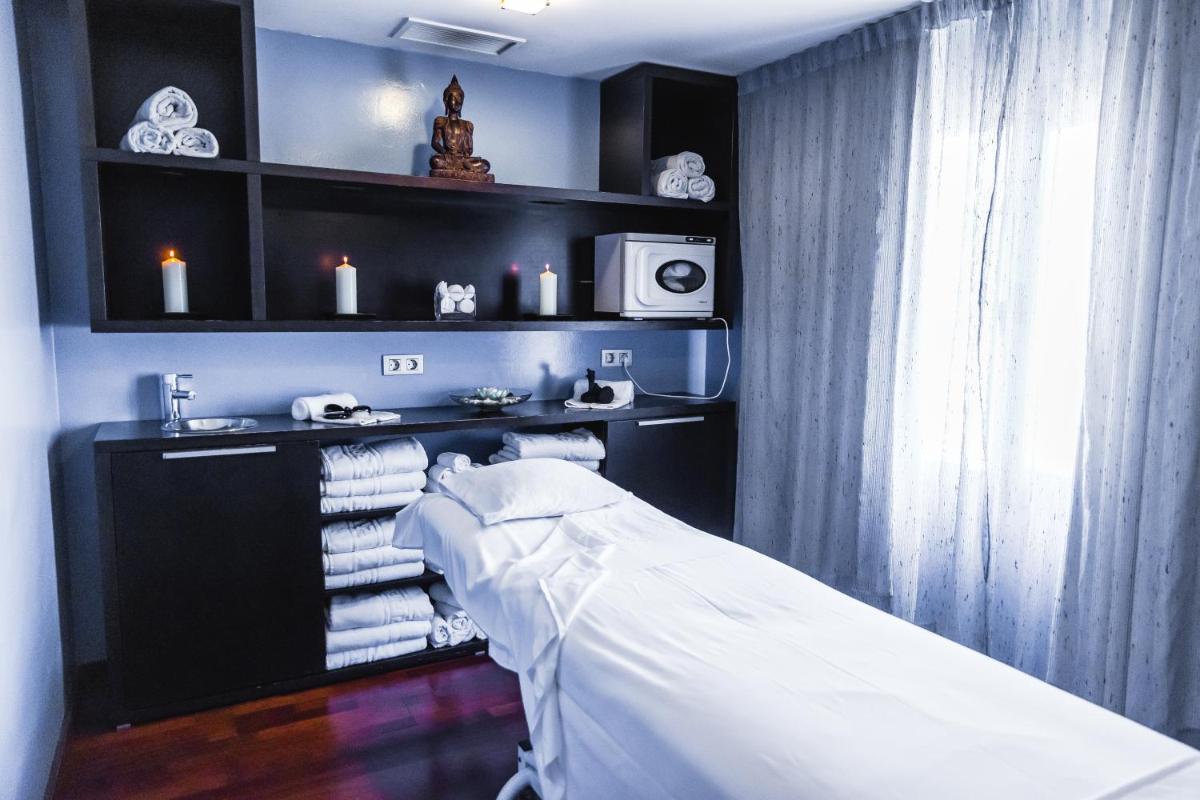 Cama o camas de una habitación en Hotel Veracruz Plaza & Spa