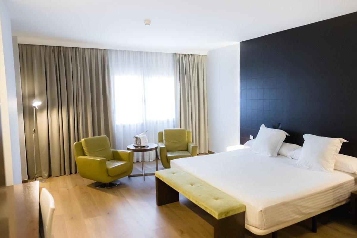 Cama o camas de una habitación en Hotel Veracruz Plaza & Spa